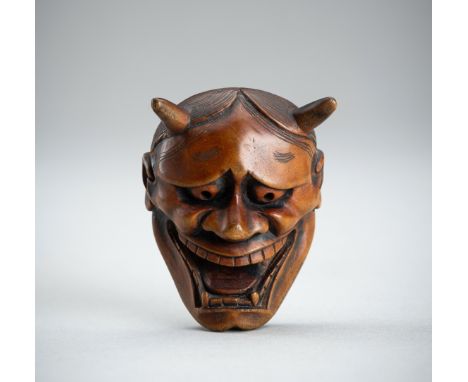 A WOOD MASK NETSUKE OF HANNYA, EDO PERIODJapan, 19th century, Edo period (1615-1868)Well carved, depicting the female demon H