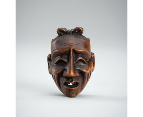 DEME UMAN: A WOOD NOH MASK NETSUKE OF SHIWAJO, EDOBy Deme Uman, signed Deme Uman 出目右滿Japan, early 19th century, Edo period (1
