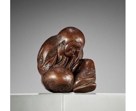 A LARGE NAGOYA SCHOOL WOOD NETSUKE OF A SLUMBERING SHOJOUnsignedJapan, Nagoya, late 18th to early 19th century, Edo period (1