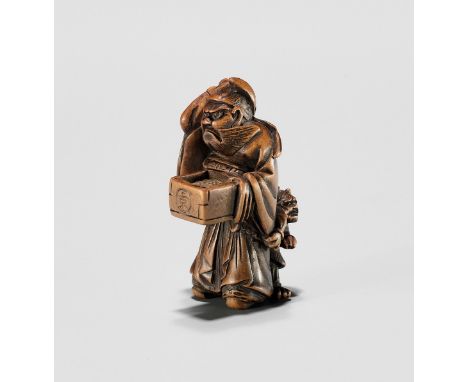 HIDEKAZU: A WOOD NETSUKE OF SHOKI AND ONI AT SETSUBUNBy Hidekazu, signed Hidekazu 秀一Japan, Osaka, 19th century, Edo period (1