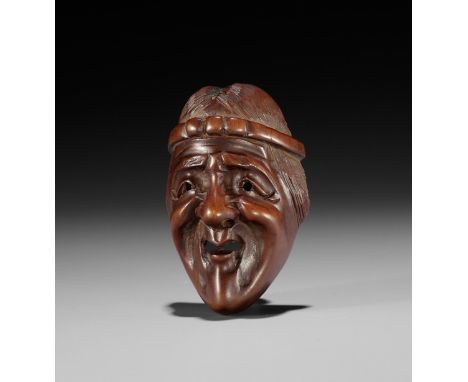 DEME: A WOOD MASK NETSUKE OF UBA, EDO PERIODBy a member of the Deme family, signed Deme to (carved by Deme)Japan, Edo (Tokyo)