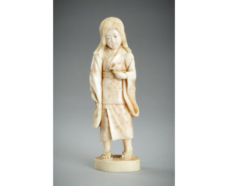 AN ARTIST SIGNED IVORY OKIMONO OF A GIRL, MEIJIJapan, late Meiji period (1868-1912)The girl standing on a flat oval base, wea