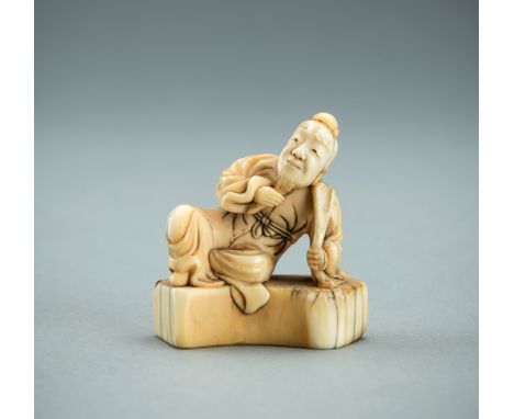 AN EARLY IVORY NETSUKE OF A SAGE, 18th CENTURYJapan, 18th century, Edo period (1615-1868) The man shown in a relaxed posture.