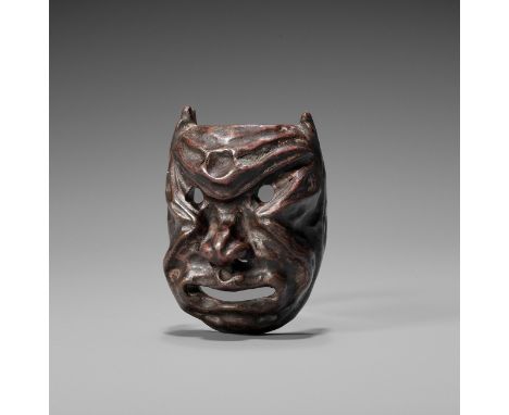A LACQUERED WOOD MASK NETSUKE OF AN ONI, EDO PERIODJapan, 19th century, Edo period (1615-1868)Carved as a two-horned demon wi