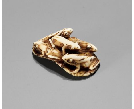 HARUUJI: A MARINE IVORY NETSUKE OF FROGS ON LOTUS LEAF, MEIJIBy Haruuji (Ujihara), signed Haruujii 春氏Japan, late 19th century