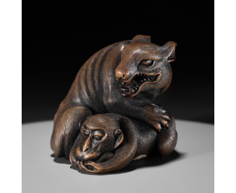 A LARGE AND FINE YAMADA SCHOOL WOOD OKIMONO NETSUKE OF A WOLF AND MONKEYBy Harumitsu (Shunko), signed Harumitsu 春光Japan, Yama