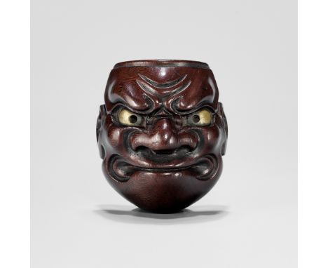 DEME UMAN: A WOOD NOH MASK NETSUKE OF O-BESHIMIBy Deme Uman, signed Deme Uman 出目右滿 Tenkaichi 天下一Japan, Edo (Tokyo), early 19t