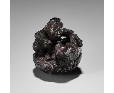 A POWERFUL WOOD NETSUKE OF INO HAYATA SLAYING THE NUEUnsignedJapan, Edo (Tokyo), 19th century, Edo period (1615-1868)Ino Haya