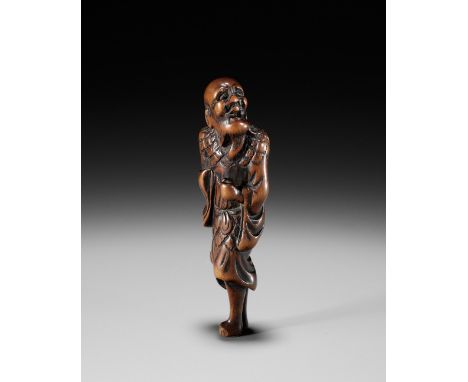AN OLD WOOD NETSUKE OF TEKKAI SENNINUnsignedJapan, 18th century, Edo period (1615-1868)Tekkai is shown exhaling is anima, his