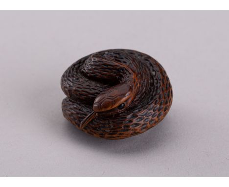 SARI: A WOOD NETSUKE OF A SNAKE, 19th CENTURYBy Sari, signed SariJapan, 19th centuryNaturalistically carved as a snake coilin