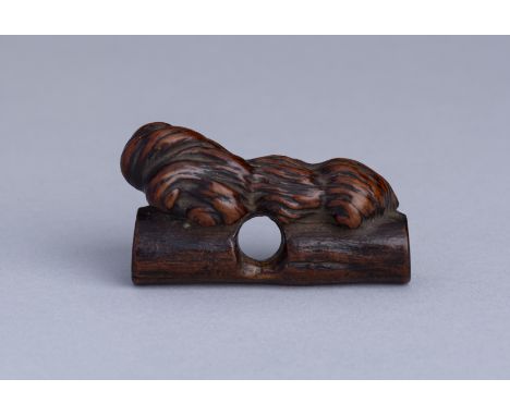 A RARE BURLWOOD NETSUKE, 19th CENTURYJapan, 19th centuryCarved from a section of burlwood and finely polished. Depicting a cy