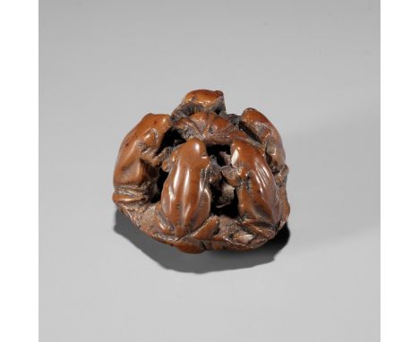 A RARE NUT NETSUKE OF FIVE FROGS ON A LOTUS LEAF, ATTRIBUTED TO SEIMINAttributed to Seimin, unsignedJapan, Iwashiro province,