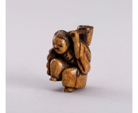 A STAG ANTLER NETSUKE OF A SHOJO WITH LADLE, EDO PERIODJapan, 19th century, Edo period (1615-1868)Carved as a shojo in a dyna