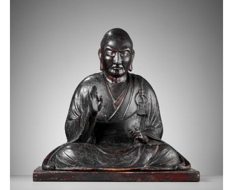 A LACQUERED WOOD FIGURE OF A SEATED BUDDHIST MONKJapan, Edo period (1615-1868)Finely carved and assembled from multiple piece