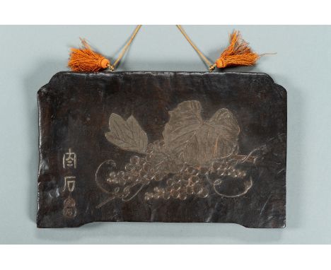 A CARVED WOODBLOCK WITH GRAPES, MEIJIJapan, Meiji period (1868-1912)Of rectangular form, carved in high relief depicting grap