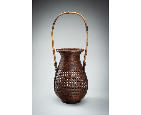 MAEDA CHIKUBOSAI II: A WOVEN BAMBOO AND RATTAN HANAKAGO (FLOWER BASKET)By Maeda Chikubosai II (1917-2003), signed Chikubosai 