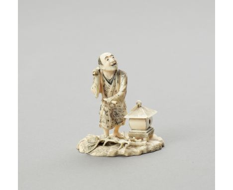 AN IVORY OKIMONO OF A TEMPLE DRUMMERSignedJapan, Meiji period (1868-1912)Standing on a naturalistically carved base, a lanter