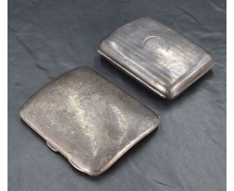An Edwardian silver cigarette case, of hinged rectangular form and curved for the gentleman's pocket, engraved with initials 