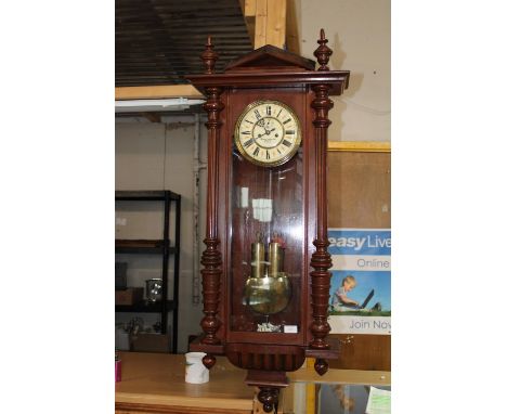 A Viennese style wall clock made by Fattorini and sons Westgate with key and weights in working order approx 115x44cm collect