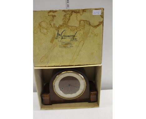 A vintage mantel clock in original box 