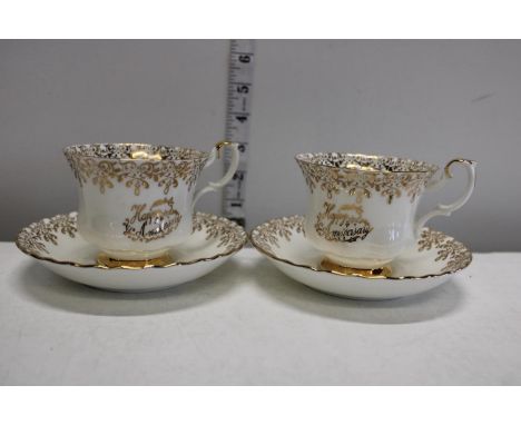 A pair of Royal Albert Happy Anniversary cups &amp; saucers 