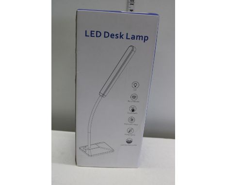 a boxed LED reading lamp 