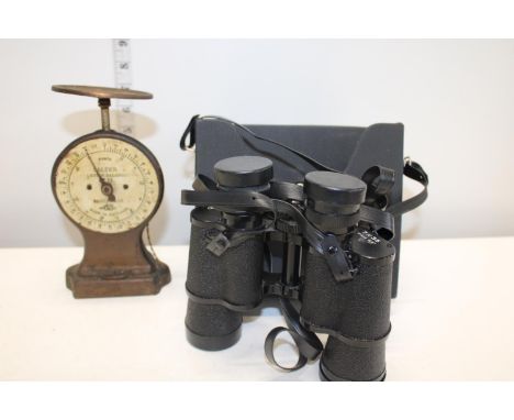 A pair of vintage binoculars &amp; weighing scales 