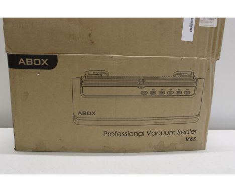 A boxed Vacuum roller/sealer 