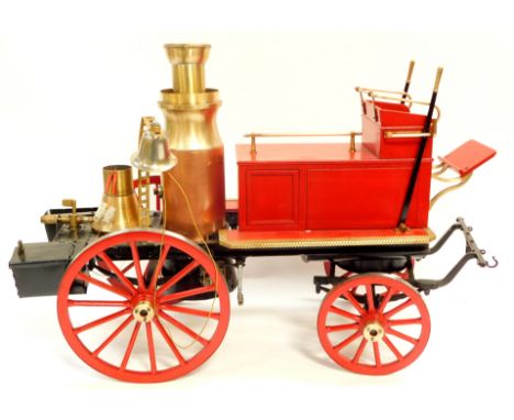 A steel and brass steam model of a Victorian horse drawn fire engine, 57cm long.