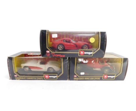 Three Burago die cast cars, 1:24 scale, comprising Dodge Viper GTS Coupe (1997)., Chevrolet Corvette (1957)., and a Mercedes 