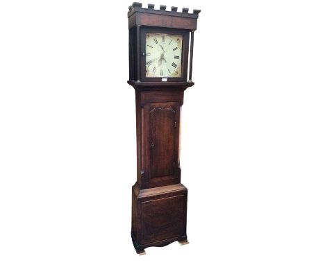 19th century 30 hour longcase clock with square painted dial in oak case with castellated top 193 cm high (no weights).