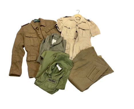 Group of British military uniforms to include a coverall named to Brown, dispatch rider’s pantaloons in size 10, Army service