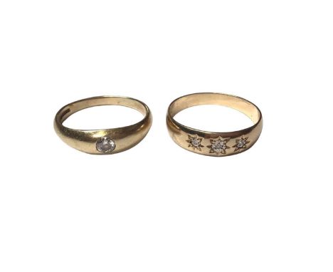 9ct gold diamond single stone ring in rub over setting and 9ct gold diamond three stone gypsy set ring, both size U (2)Weight