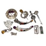 Collection of Scottish silver, hardstone and gem set brooches, together with Scottish style Miracle