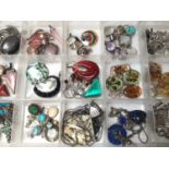 Collection of silver and white metal mounted pendants including semi precious gem stones, pressed fl
