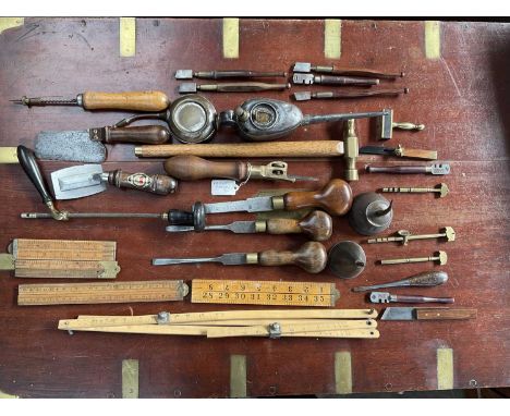 Interesting group of 19th century and later hand tools to include screwdrivers, brass pad saw, oil cans, rules and other item