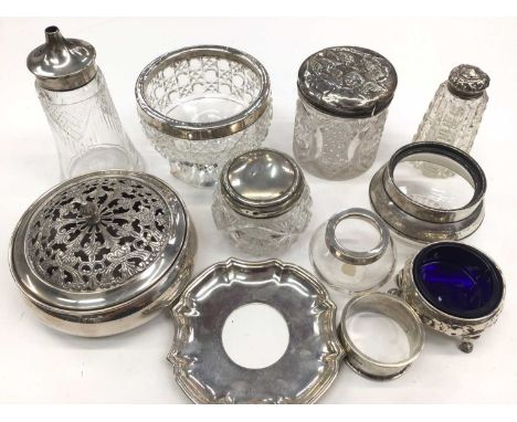Group of silver mounted glass jars, castors etc, Victorian silver salt with blue glass liner, silver napkin ring, continental