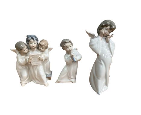 Twelve Lladro porcelain figures of Angels, some playing musical instruments