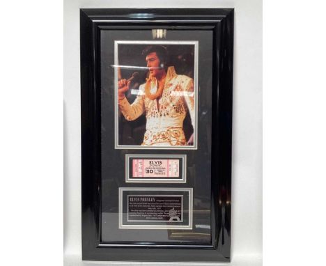 Group of Elvis Presley memorabilia, including framed records, ticket, and strands of hair