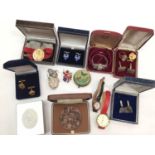 Pair of silver and enamel sheild crest cufflinks and similar style rampant lion brooch, two silver s