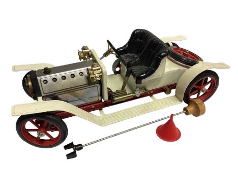 Mamod live steam traction engine and touring car.
