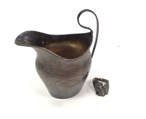 George V silver cream jug (Birmingham 1912), together with a white metal leaf ring (2)The jug weighs 100 grams