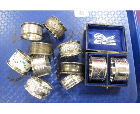 A Collection of Eleven Hallmarked Silver Napkin Rings, (some marks rubbed/indistinct) including pair with engraved decoration