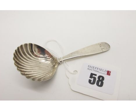 A Georgian Hallmarked Silver Caddy Spoon, TN, possibly London 1786, with shell bowl, initialled. 