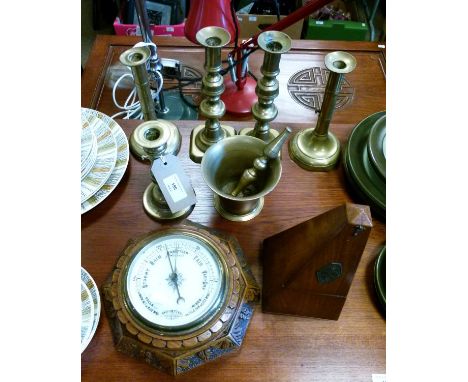 Early 20th Century carved oak cased octagonal aneroid barometer, metronome, two pairs of candlesticks etc   Condition: 