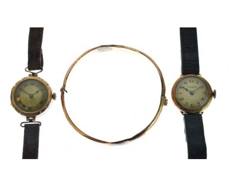 Two lady's 9ct gold cased wristwatches and a gold coloured metal snap bangle   Condition: 