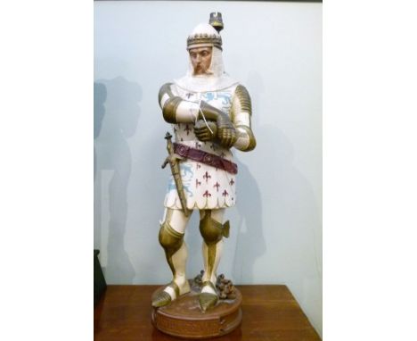 Painted spelter figure 'Le Prince Noir' on circular plinth, converted to a table lamp   Condition: 