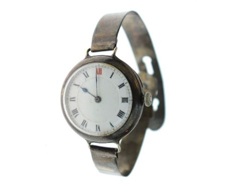 Early 20th Century silver cased fob watch now converted to a wristwatch, the white enamel dial with Roman numerals   Conditio