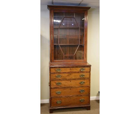 George III mahogany secretaire chest with later bookcase top, the upper section fitted three shelves enclosed by a glazed doo