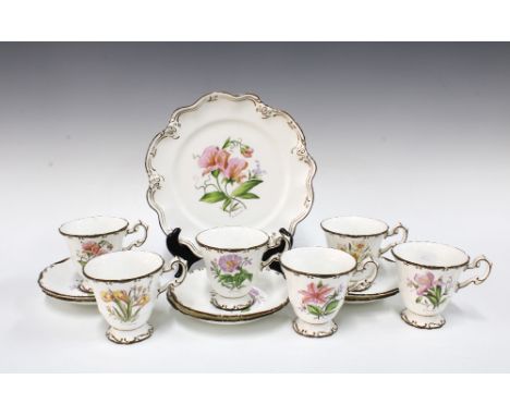 Six Coalport botanical cups and saucers, together with a cake plate (13)